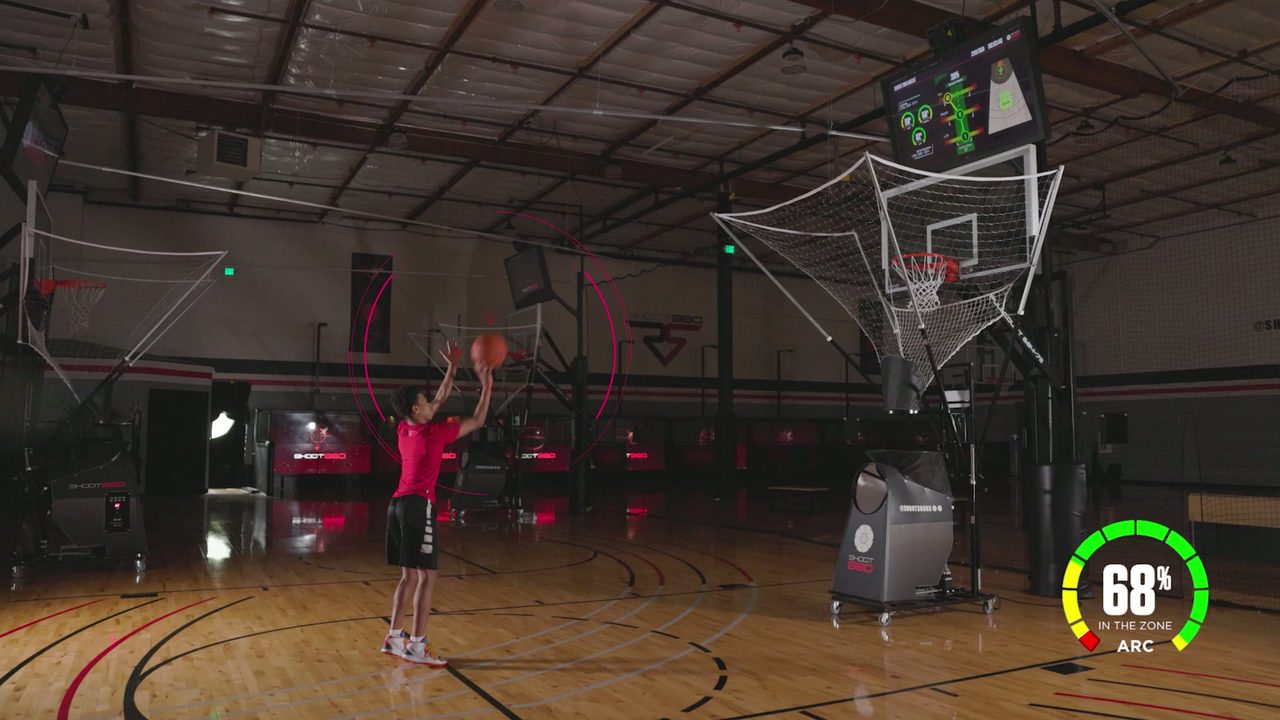 Player shooting at a Splash Meter hoop with the arc reading overlaid