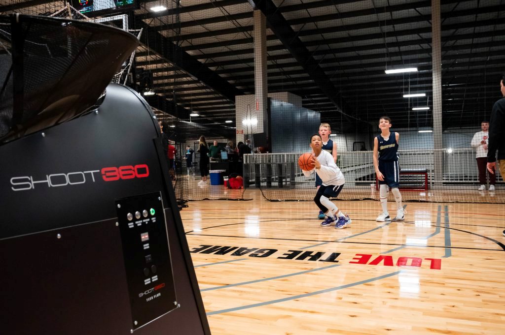 Kids shooting on Splash Meter courts during a party